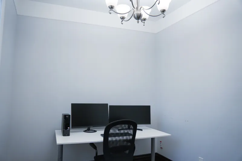 Private main-floor office with hardwood floor