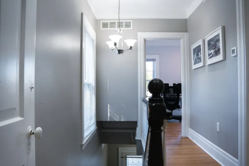 Upper-floor landing with framed art